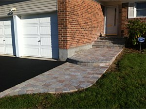 unilock brussels stoop tumbled brick round curved step sandstone limestone terracotta mix walkway porch steps brick pavers